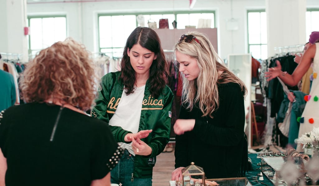 Shoppers trying on items at A Current Affair. Shoppers trying on items at A Current Affair.