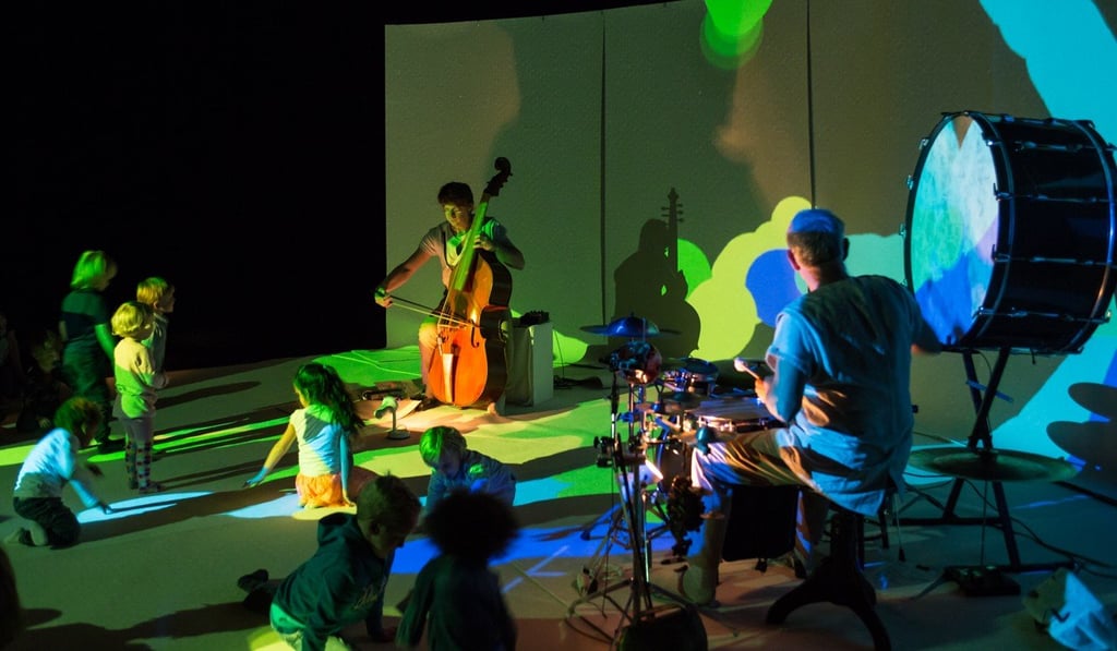 Musicians Tony Overwater on violone (left), and Joshua Samson on percussion create a colourful dreamlike world for youngsters in their interactive show, Glimpse. Photo: Ronald Knapp