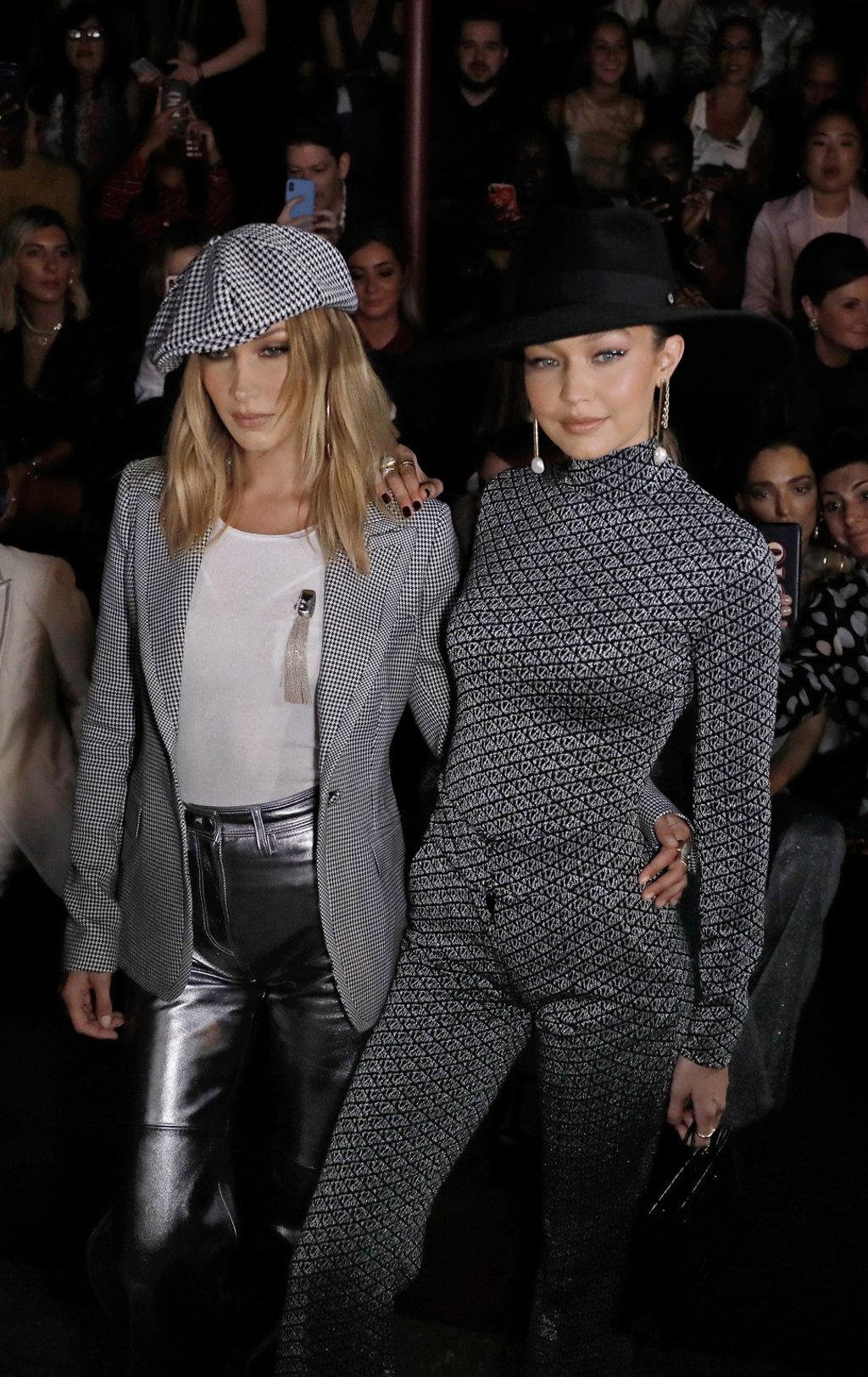 Bella (left) and Gigi Hadid pose for photographers before the Tommy Hilfiger fashion show during New York Fashion Week, September 2019. Photo: EPA-EFE