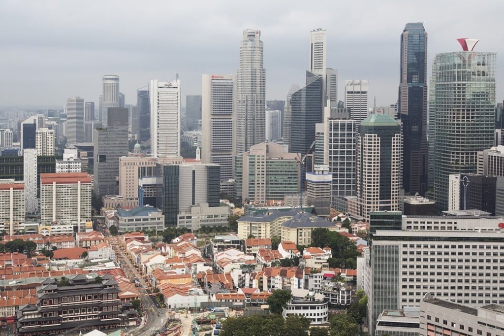 An oversupply of flats threatens to lower Singapore’s property prices. Photo: Bloomberg