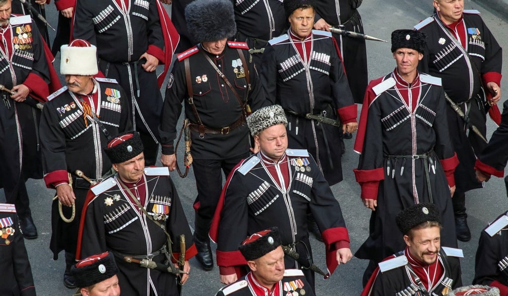 Cossacks in Sevastopol, Crimea attend a procession dedicated to the anniversary of anti-Bolshevik’s army evacuation from Crimea in 1920. Photo: Reuters