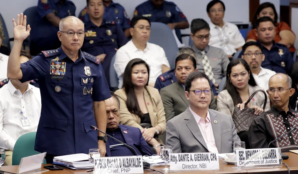 Oscar Albayalde (left) stepped down as director general last month. Photo: AP