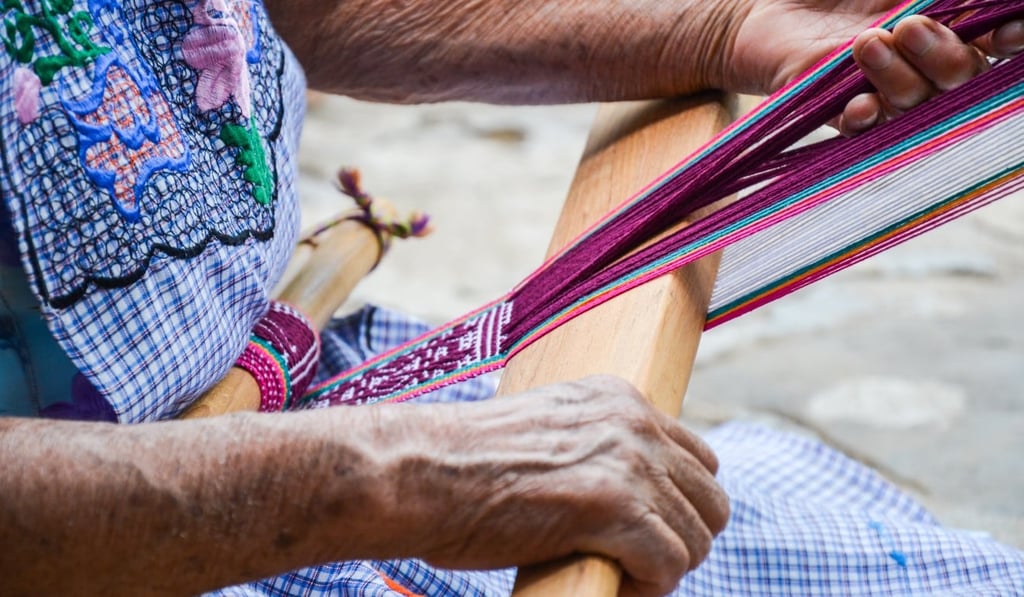 You can pick up some woven cloth in a souvenir shop in Oaxaca, or you can learn to make your own from the locals