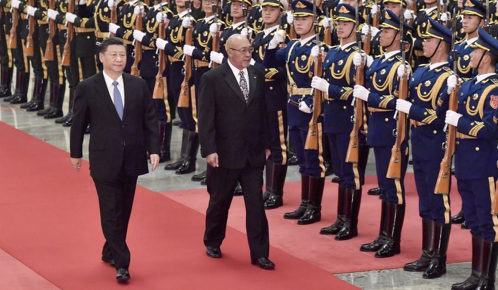 Chinese President Xi Jinping holds a welcome ceremony for Suriname's President Desire Bouterse before their talks at the Great Hall of the People in Beijing on Wednesday. Photo: Xinhua