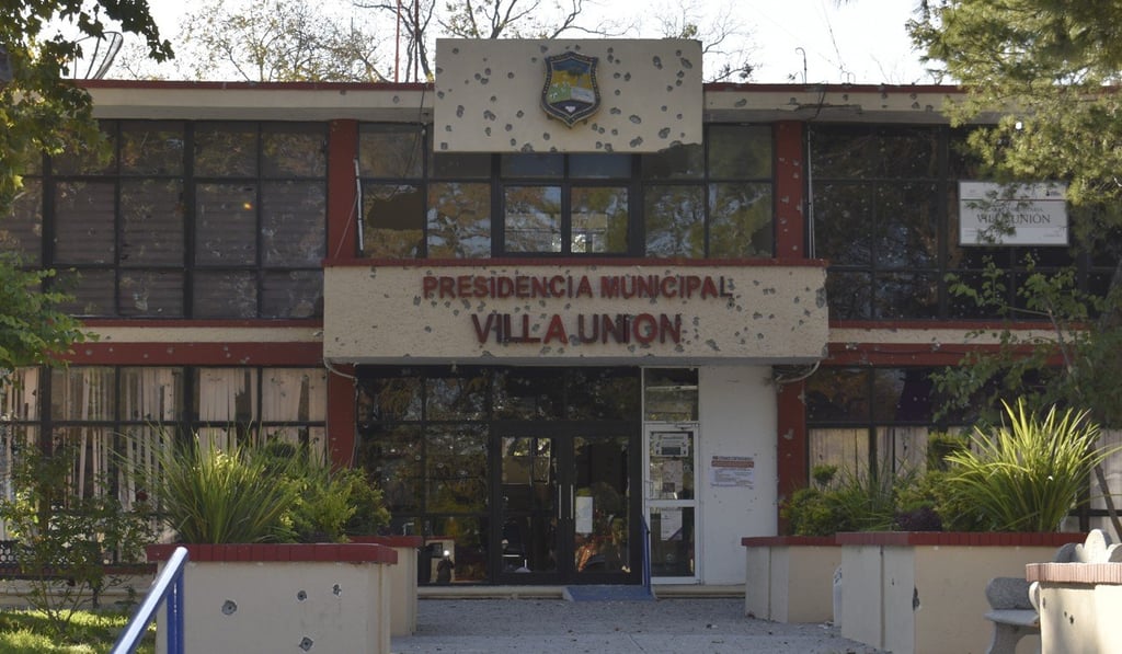 The City Hall of Villa Union, riddled with bullet holes. Photo: AP
