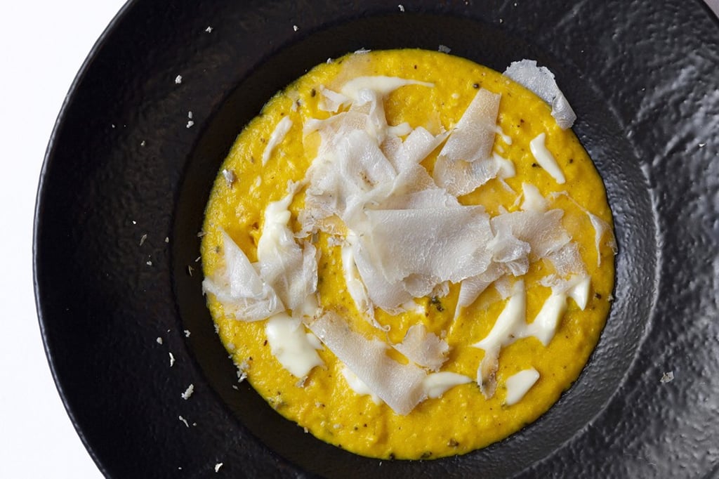 Giando’s scrambled eggs on 36-month Parmesan cheese fondue and shaved white truffle Giando’s scrambled eggs on 36-month Parmesan cheese fondue and shaved white truffle