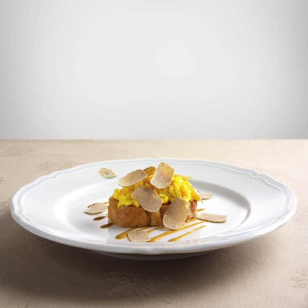 Sabatini’s organic Italian scrambled eggs on toast with shaved white truffle