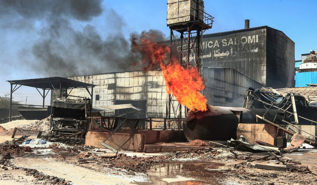 A burning gas tank at the scene of a fire at a tile manufacturing unit in an industrial zone in Khartoum. Photo: AFP A burning gas tank at the scene of a fire at a tile manufacturing unit in an industrial zone in Khartoum. Photo: AFP