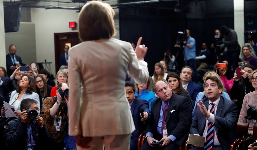 US House Speaker Nancy Pelosi returns to the stage and the podium to challenge Sinclair reporter James Rosen (right) after he asked her: “Do you hate the President?” Photo: Reuters US House Speaker Nancy Pelosi returns to the stage and the podium to challenge Sinclair reporter James Rosen (right) after he asked her: “Do you hate the President?” Photo: Reuters