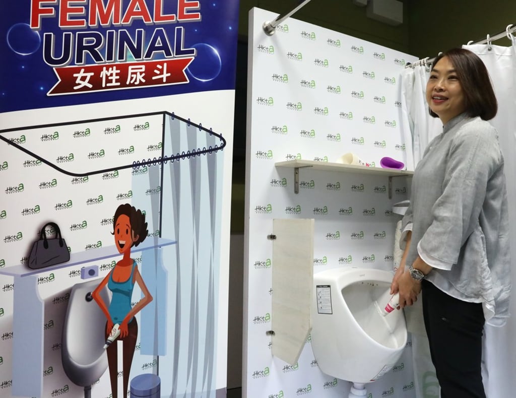 Peggy Tsui, the honorary secretary of the Hong Kong Toilet Association, shows how to use a female urinal. Photo: KY Cheng Peggy Tsui, the honorary secretary of the Hong Kong Toilet Association, shows how to use a female urinal. Photo: KY Cheng