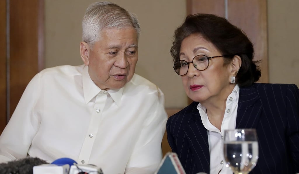 Former Philippine Foreign Secretary Albert del Rosario, left, and former chief anti-corruption prosecutor Conchita Carpio-Morales. Photo: AP