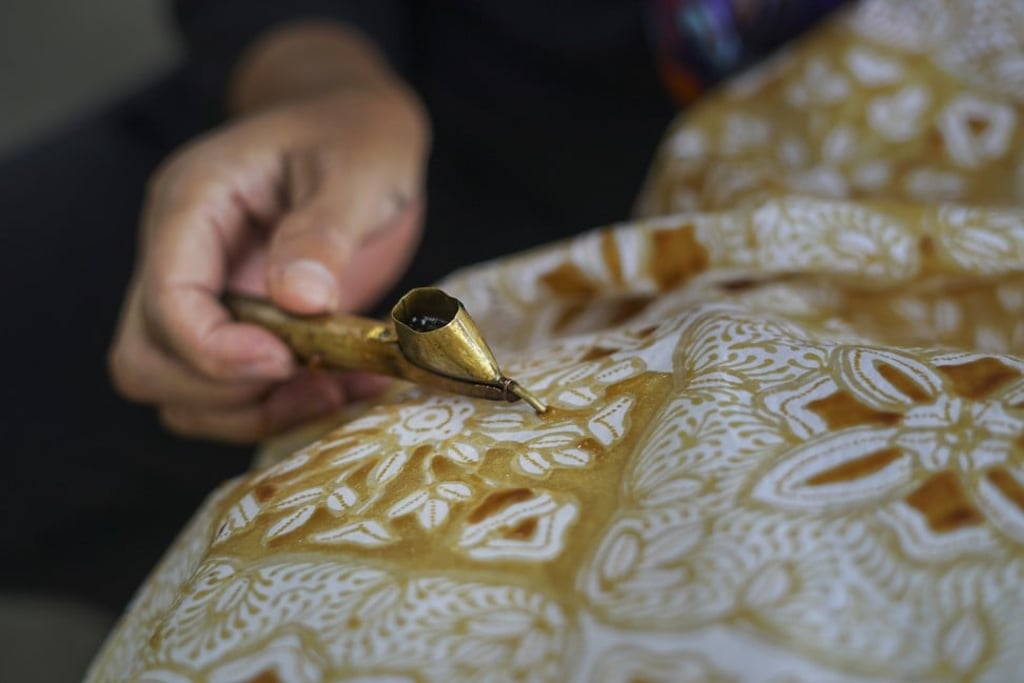 Batik is a cloth with hand-drawn patterns made using hot wax and dye. Photo: Hendra Nurdiyansyah Batik is a cloth with hand-drawn patterns made using hot wax and dye. Photo: Hendra Nurdiyansyah
