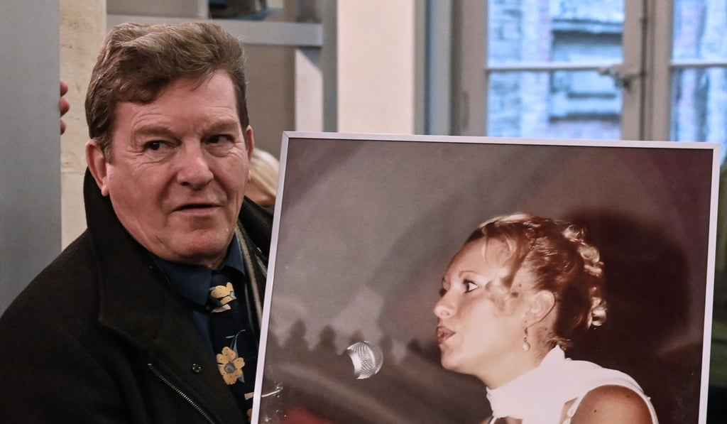 Jacky Kulik, the father of Elodie Kulik who was raped and murdered in 2002, poses with a portrait of his daughter. Photo: AFP