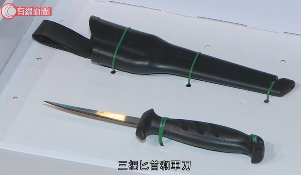 Officers told the media they had seized several weapons during the morning raids. Photo: Cable TV News