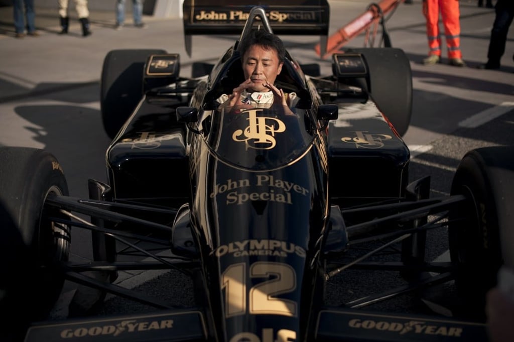 Kazunori Yamauchi inside a Lotus Ayrton Senna at Ascari racetrack during the launch of Gran Turismo 6. Photo: AFP