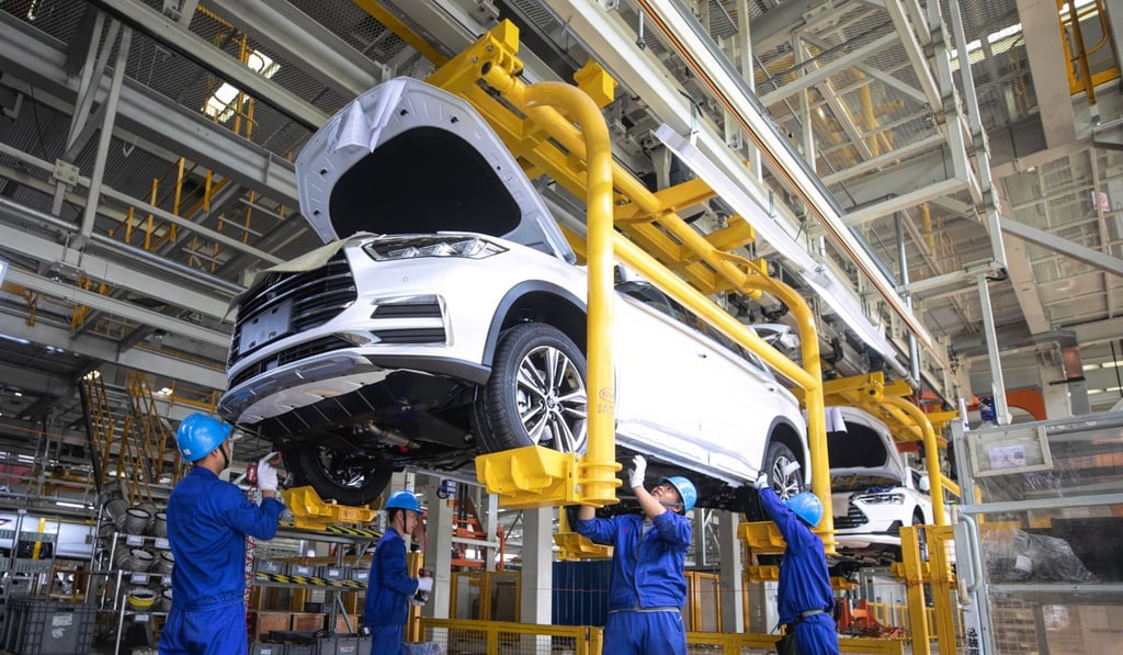 Employees work in the BYD’s electric car factory in Xian, Shaanxi province. Photo: EPA-EFE