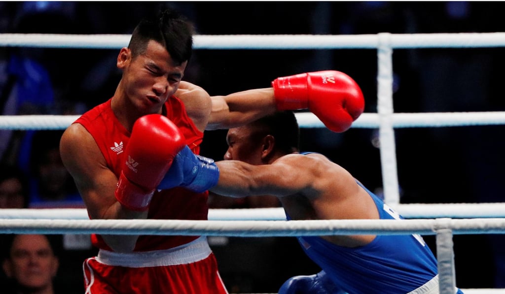Marcial lands a devastating left straight to his Vietnamese opponent’s face in the within the first 30 seconds of the fight. Photo: Reuters
