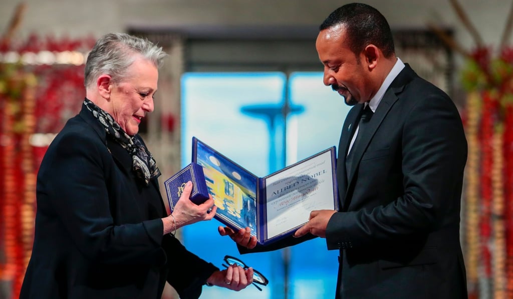 Ethiopia’s PM and Nobel Peace Prize Laureate Abiy Ahmed Ali receives the Nobel Peace Prize from Berit Reiss-Andersen, chair of the Norwegian Nobel Committee in Oslo on December 10, 2019. Photo: NTB Scanpix / AFP Ethiopia’s PM and Nobel Peace Prize Laureate Abiy Ahmed Ali receives the Nobel Peace Prize from Berit Reiss-Andersen, chair of the Norwegian Nobel Committee in Oslo on December 10, 2019. Photo: NTB Scanpix / AFP