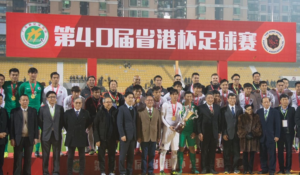 Hong Kong celebrate their Interport Cup victory in 2018 in Guangzhou. Photo: HKFA