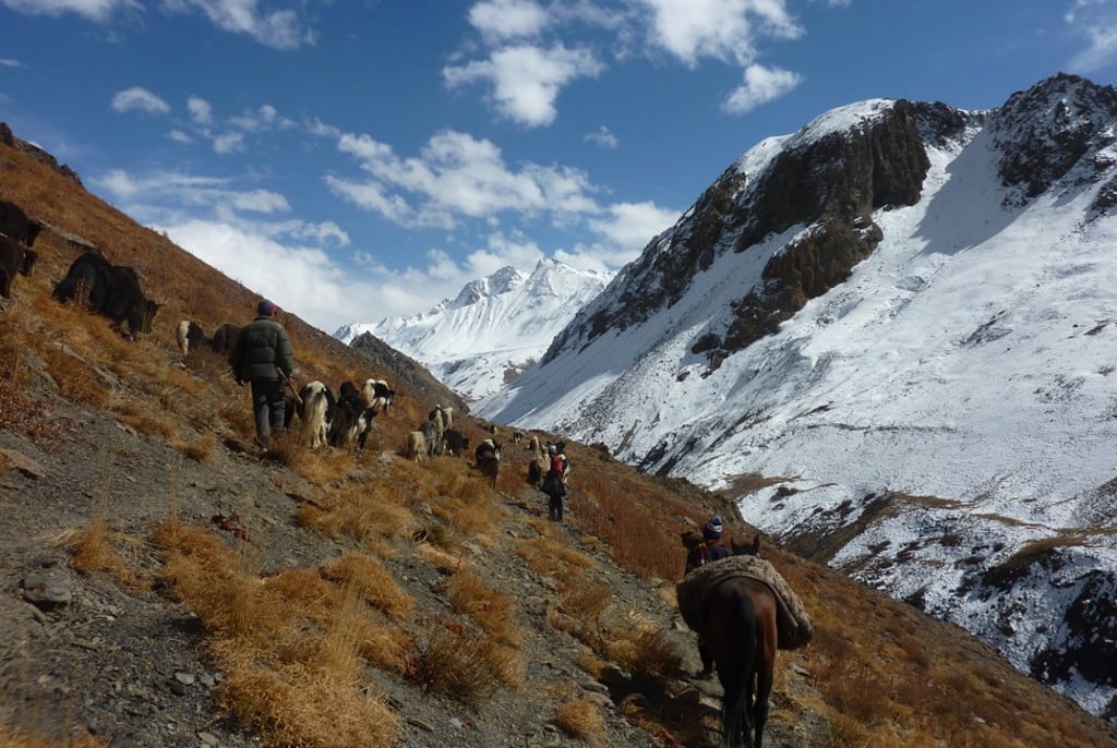 Traders from Pakistan’s northern Hunza valley travel through the Wakhan Corridor of Badakhshan province in northern Afghanistan, bordering China, in October 2017. With an inhospitable terrain, Afghanistan looks unbecoming of a superpower’s attention. But as a gateway linking Asia and the Middle East, it has become vital in the power struggle over the Eurasian land mass. Photo: AFP