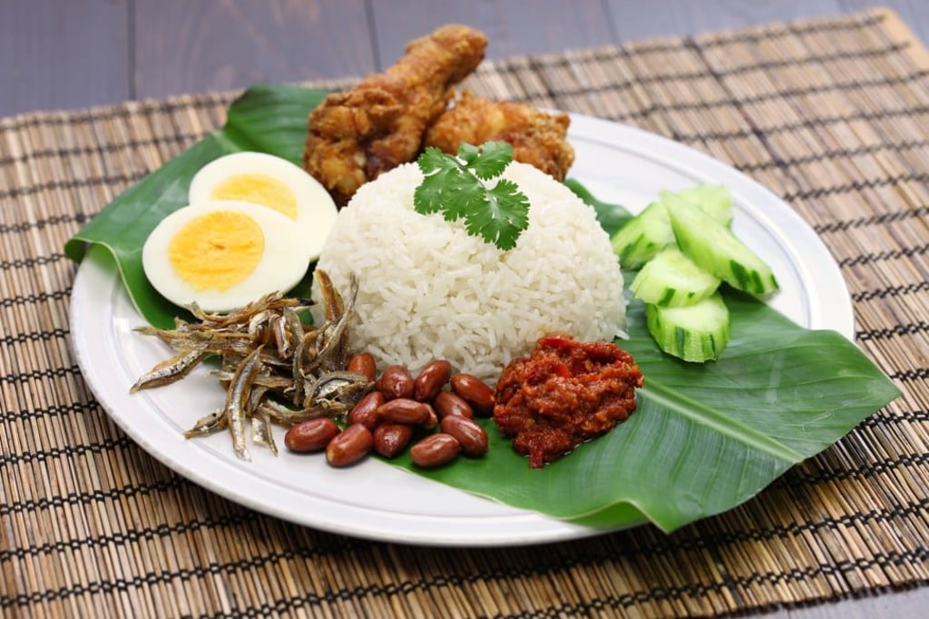 Nasi lemak is sometimes served with chicken
