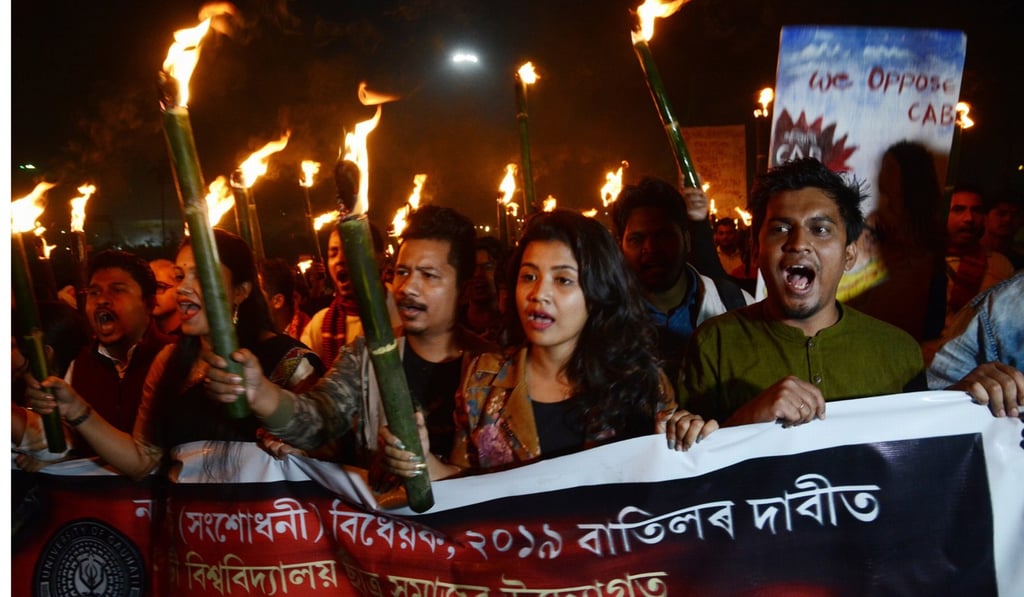 Students take part in a torchlight procession against the citizenship amendment bill. Photo: EPA-EFE Students take part in a torchlight procession against the citizenship amendment bill. Photo: EPA-EFE