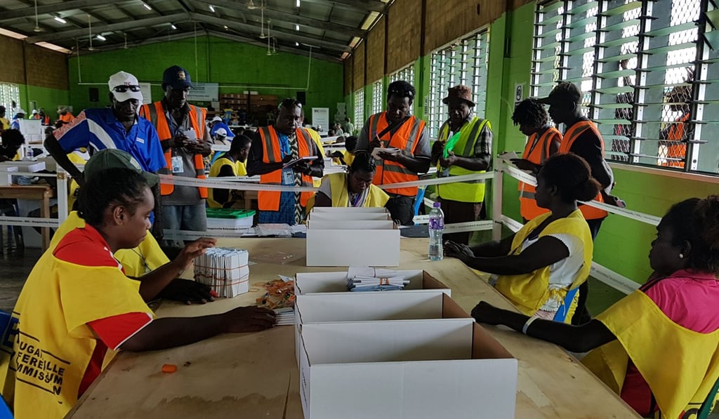 Bougainville Referendum Commission staff counting votes before the referendum results were announced. Photo: AFP