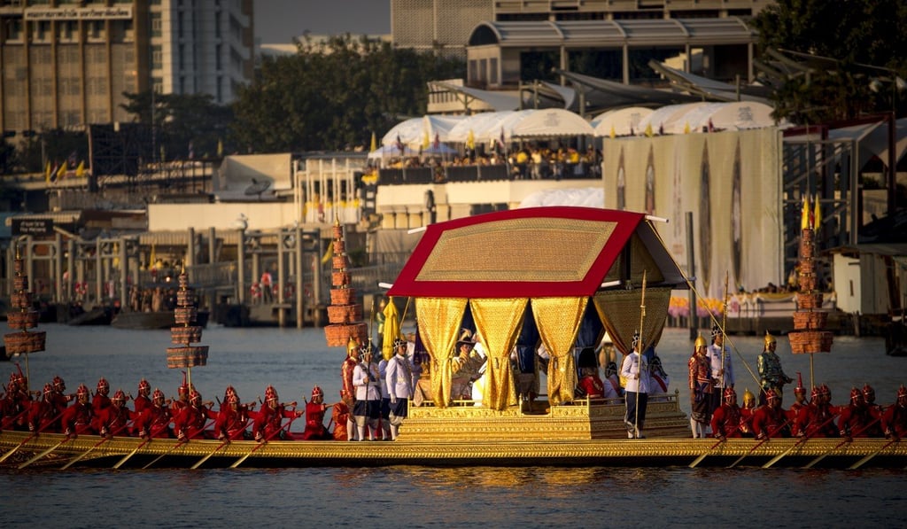 The royal barge carries the king and queen of Thailand during a procession in Bangkok. Photo: EPA-EFE The royal barge carries the king and queen of Thailand during a procession in Bangkok. Photo: EPA-EFE