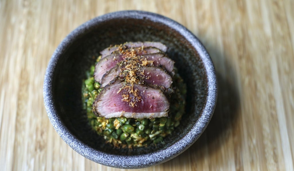 Coconut-smoked duck with mixed bean salad. Photo: Xiaomei Chen