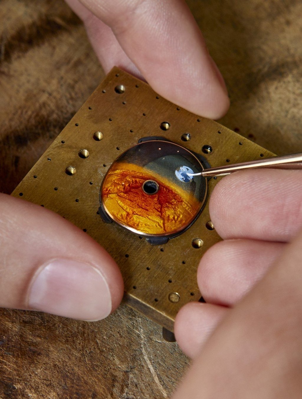 It takes 24 hours of grand-feu enamelling and hand-painting to create the visor. Photo: Handout It takes 24 hours of grand-feu enamelling and hand-painting to create the visor. Photo: Handout