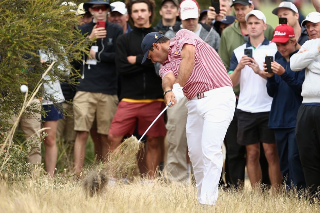 Patrick Reed of the United States team in action during day one of the 2019 Presidents Cup. Photo: EPA