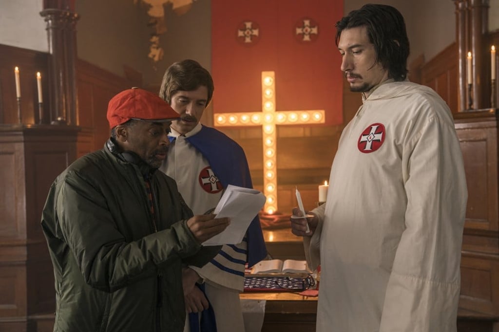 Director Spike Lee (left) with actors Topher Grace (centre) and Adam Driver on the set of Lee's film BlacKkKlansman. Photo: AP