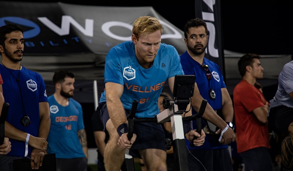 Patrick Vellner on the stationary bike on day one of the competition. Photo: Dubai CrossFit Championship