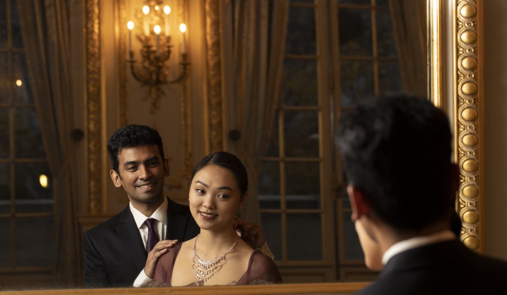 Jane Li, daughter of Jet Li, with jeweller Harakh Mehta before Le Bal des Debutantes in Paris.