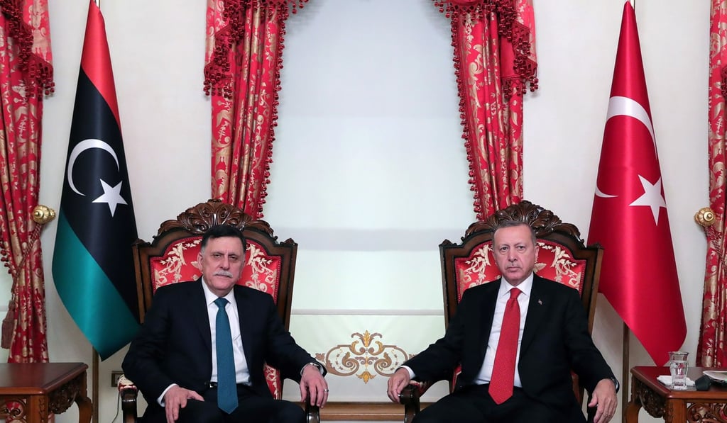 Turkish President Tayyip Erdogan meets with Libya's internationally recognised Prime Minister Fayez al-Sarraj in Istanbul. Photo: Presidential Press Office via Reuters