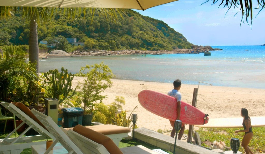 The charming beachfront at Riyue Bay in Hainan, which offers four thriving surfing clubs for enthusiasts of the sport.