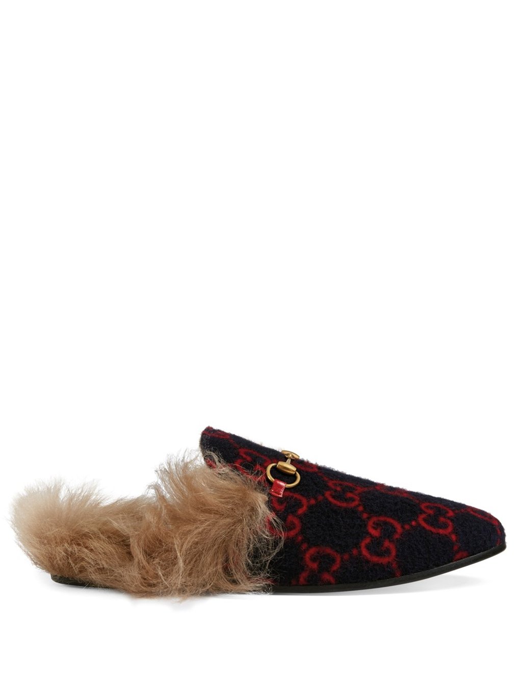 For women’s footwear, the fabric appears in the Princetown slippers with a fluffy wool lining. For women’s footwear, the fabric appears in the Princetown slippers with a fluffy wool lining.