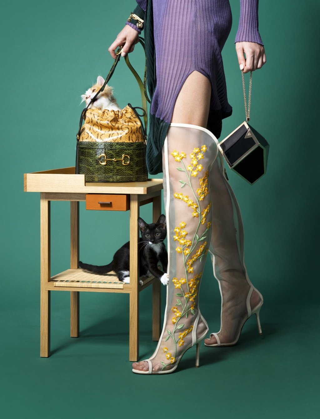 Bottega Veneta dress, HK$25,500; Stuart Weitzman boots, price on request; Jimmy Choo box clutch, HK$23,200; Gucci bucket bag, price on request; Celine bangles, price on request, bracelet, HK$8,900; Hermès side table, HK$70,200