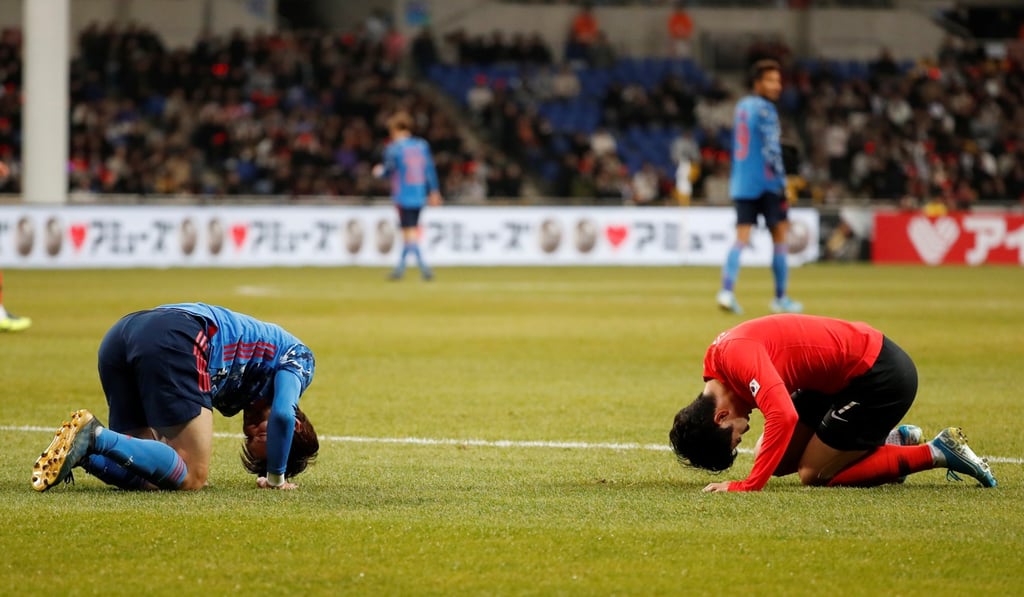Japan's Keita Endo and South Korea's In-Sung Kim. Photo: Reuters
