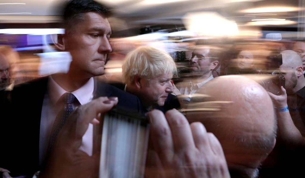 British Prime Minister Boris Johnson, centre, attends the launch of the Conservative Party Scottish Manifesto on November 26. Photo: Reuters