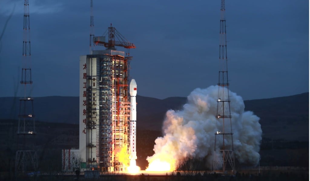 The satellite, and eight others, were put into orbit by a Long March-4B rocket. Photo: ImagineChina The satellite, and eight others, were put into orbit by a Long March-4B rocket. Photo: ImagineChina