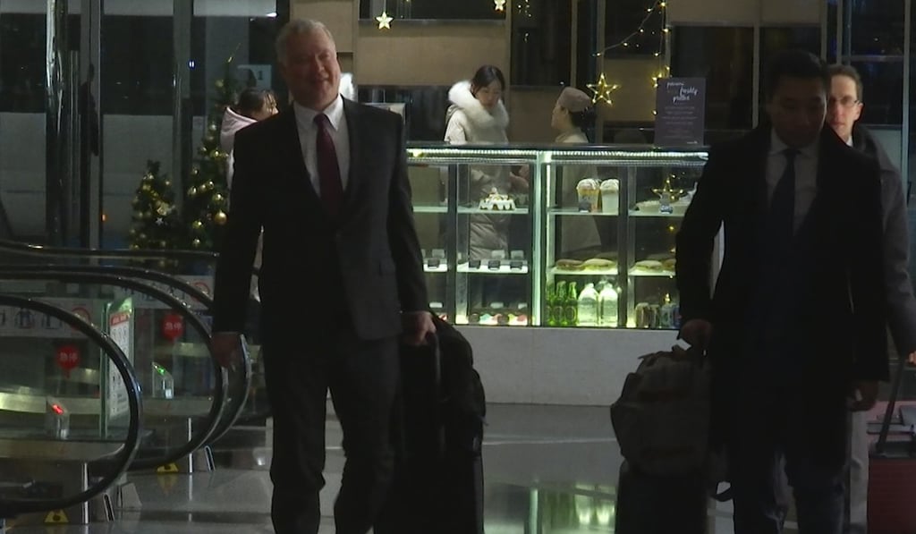US special representative for North Korea Stephen Biegun (left) arrives at a hotel in Beijing on Thursday. Photo: AP