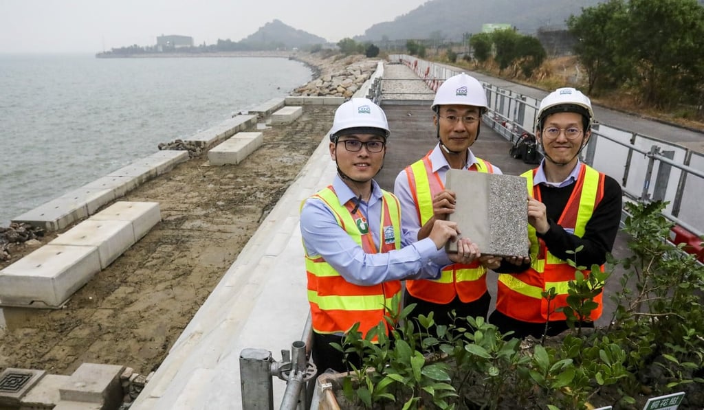 (From left) Poon Wai-wing, Michael Fong and engineer Jason Cheung at the shoreline project. Photo: May Tse