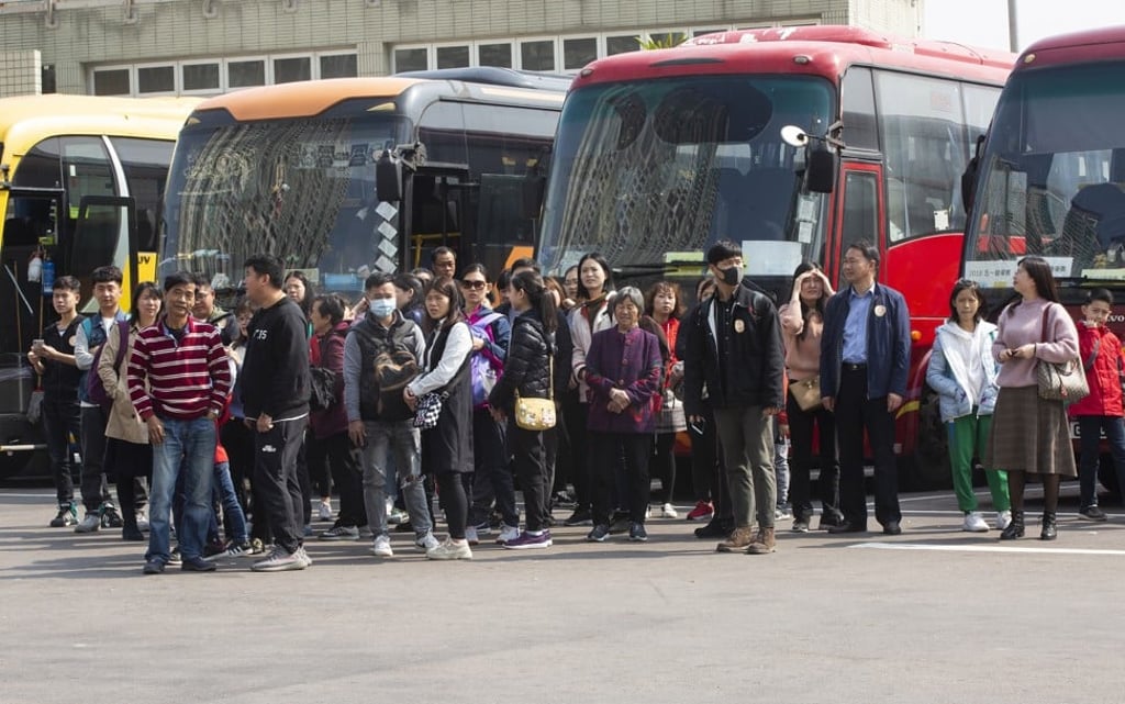 Mainland tourists in Hong Kong, in January. The image of large groups bused in and then onto the next destination prevails. Photo: EPA