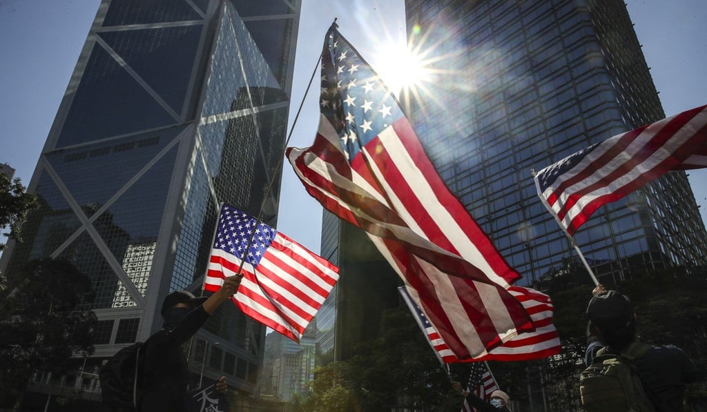 Anti-government protesters hold a rally celebrating the signing of the Hong Kong Human Rights and Democracy Act by US President Donald Trump. Photo: Winson Wong Anti-government protesters hold a rally celebrating the signing of the Hong Kong Human Rights and Democracy Act by US President Donald Trump. Photo: Winson Wong