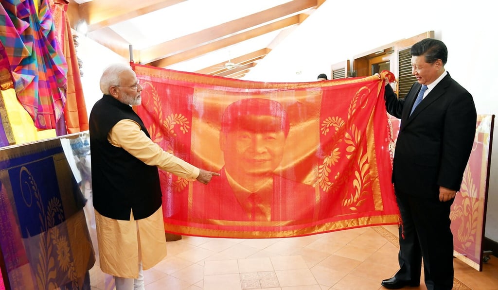 Narendra Modi with Xi Jinping at an informal summit in India in October. Photo: Reuters