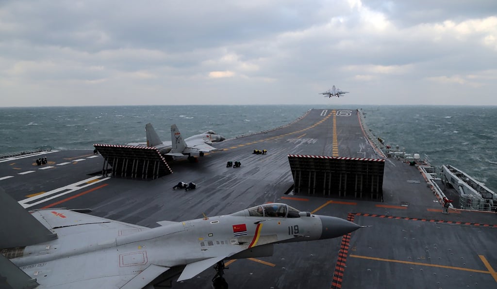 Chinese J-15 fighter jets on the deck of the Shandong’s sister ship, the Liaoning. Photo: AFP
