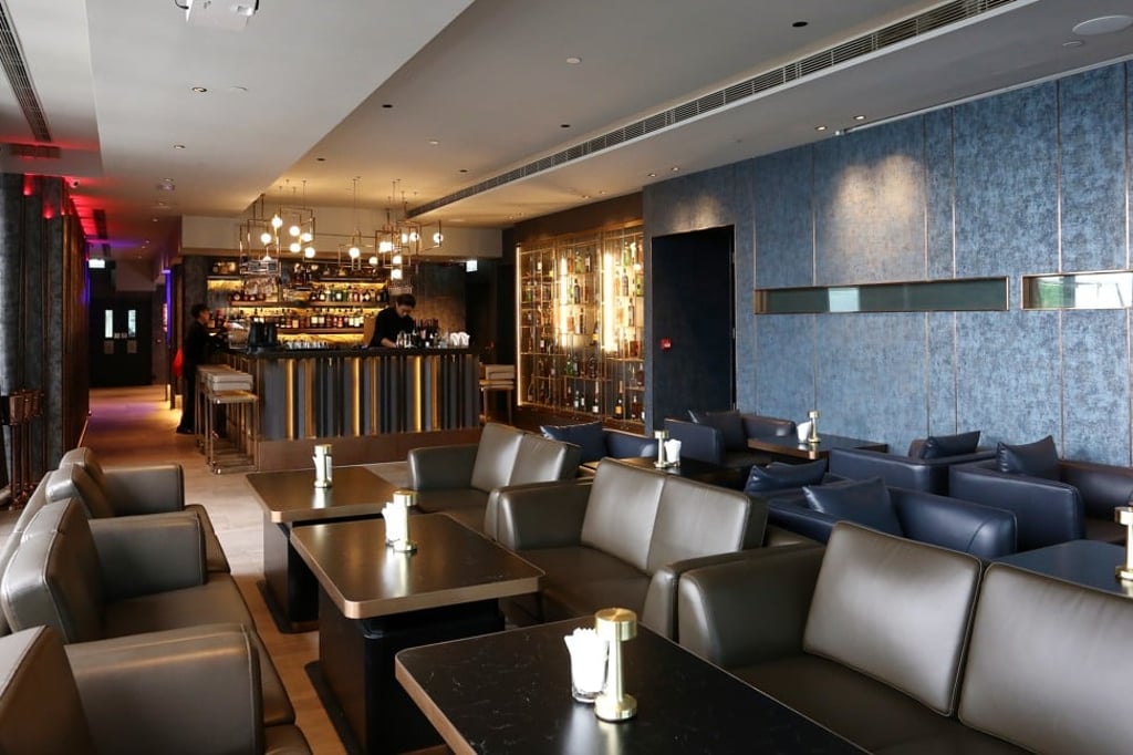 Diners sit on low chairs and eat off knee-level tables at Zeng in Causeway Bay. Photo: Jonathan Wong