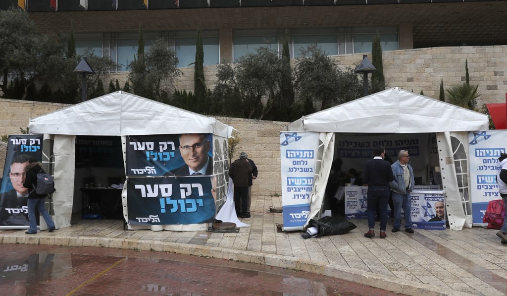 Election booths for the Israeli prime minister Benjamin Netanyahu and rival Gideon Saar in Jerusalem on Thursday. Photo: EPA-EFE