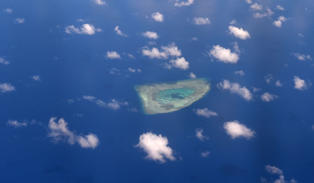 A view of a reef in the disputed Spratly Islands. Claimant countries could make clear that any environmental cooperation in the area does not constitute recognition of Chinese claims to these islands. Photo: AFP